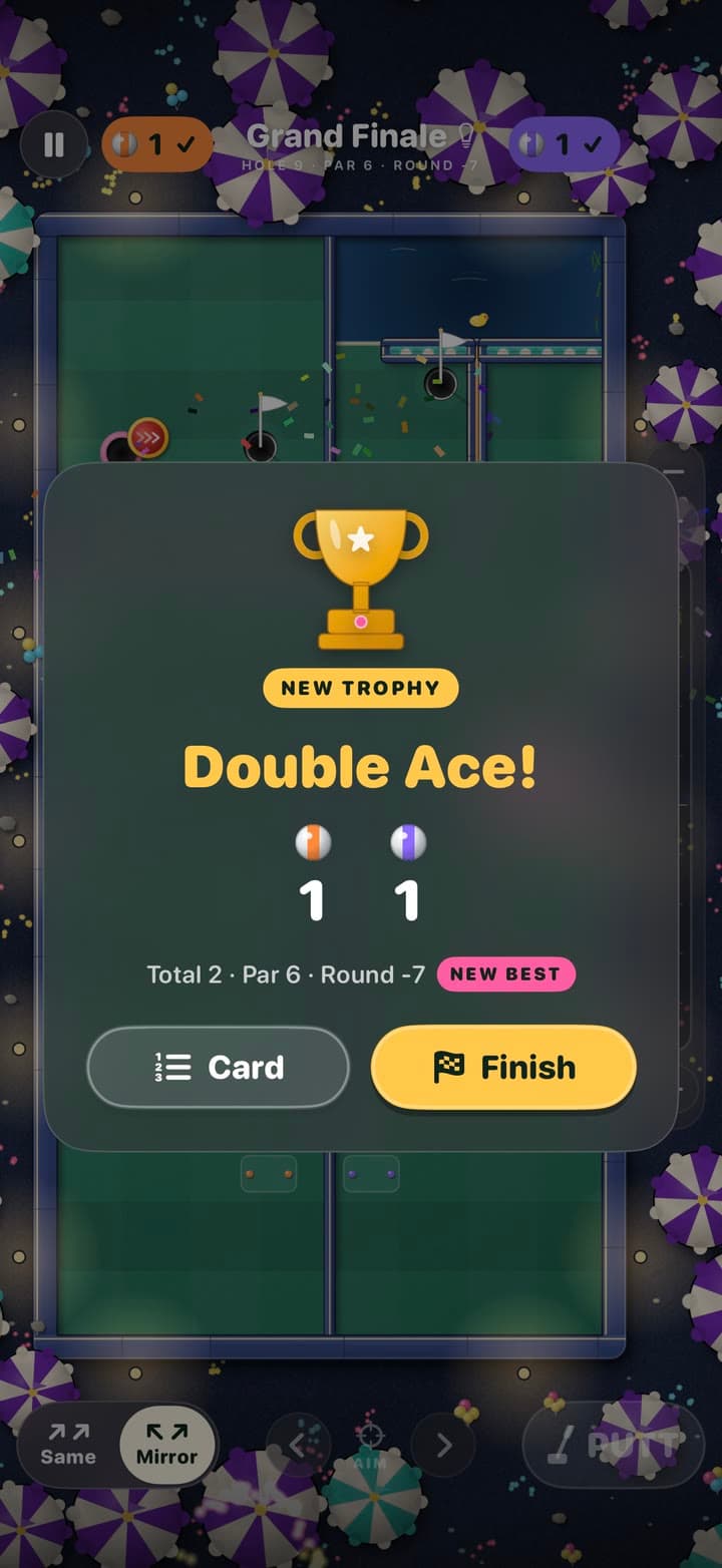 A double ace on Grand Finale: confetti over the course, and the Double Ace! card with its new trophy.